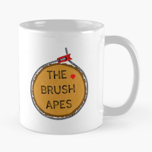 The Brush Apes logo on a white ceramic coffee mug.